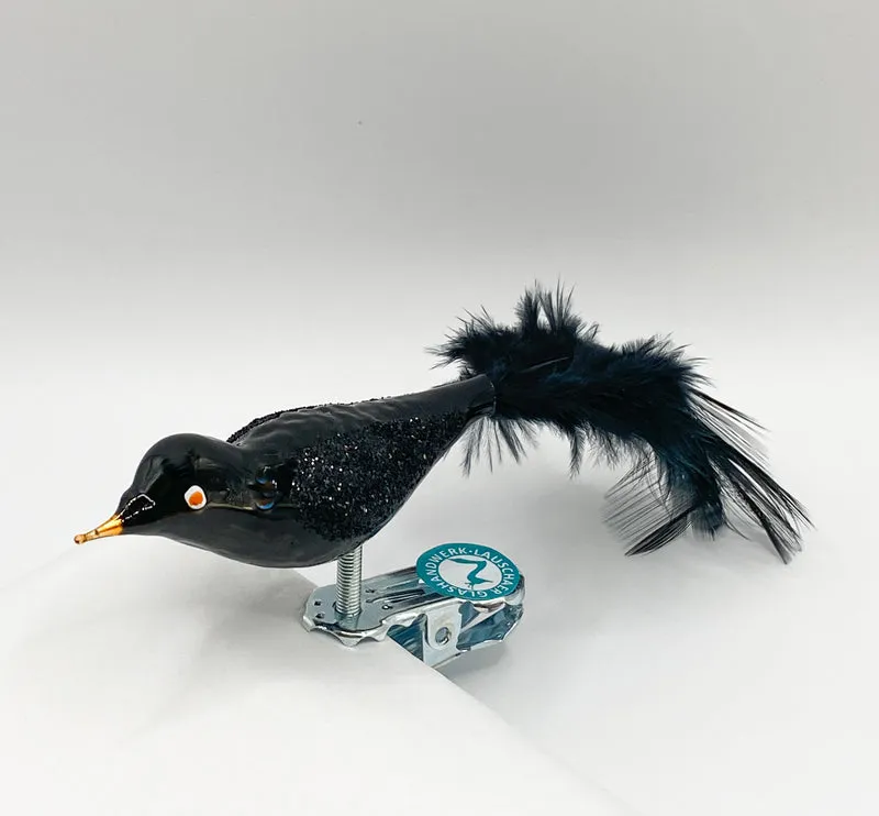 Kleine Glitzer-Amsel