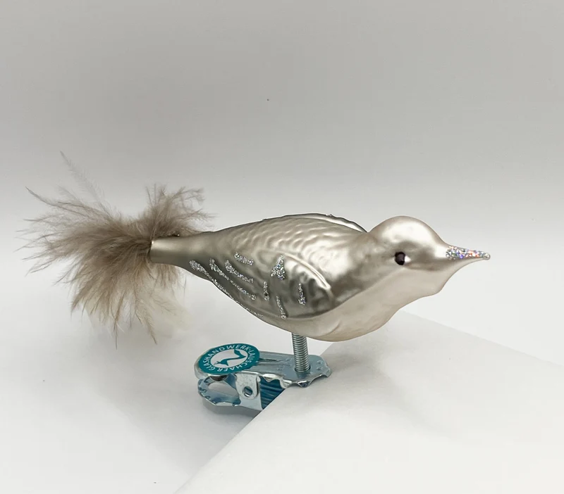 Vogel in warmem grau mit Glitzer