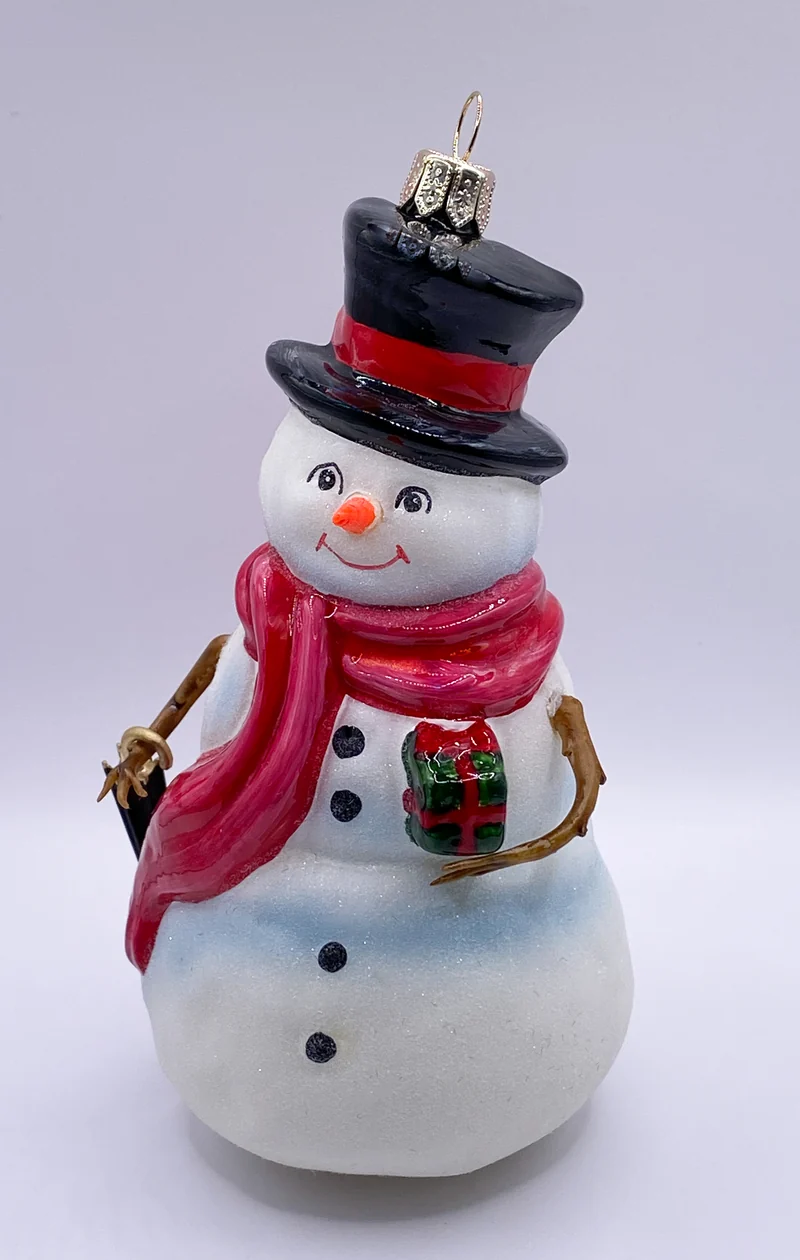 Herr Schneemann mit Regenschirm, KOMOZJA MOSTOWSKI