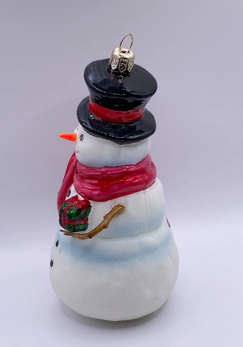Herr Schneemann mit Regenschirm, KOMOZJA MOSTOWSKI