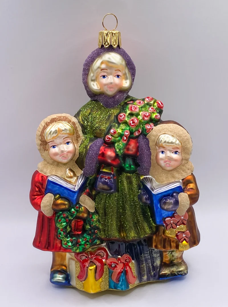 Die Mädchen singen mit der Mama Weihnachtslieder, KOMOZJA MOSTOWSKI