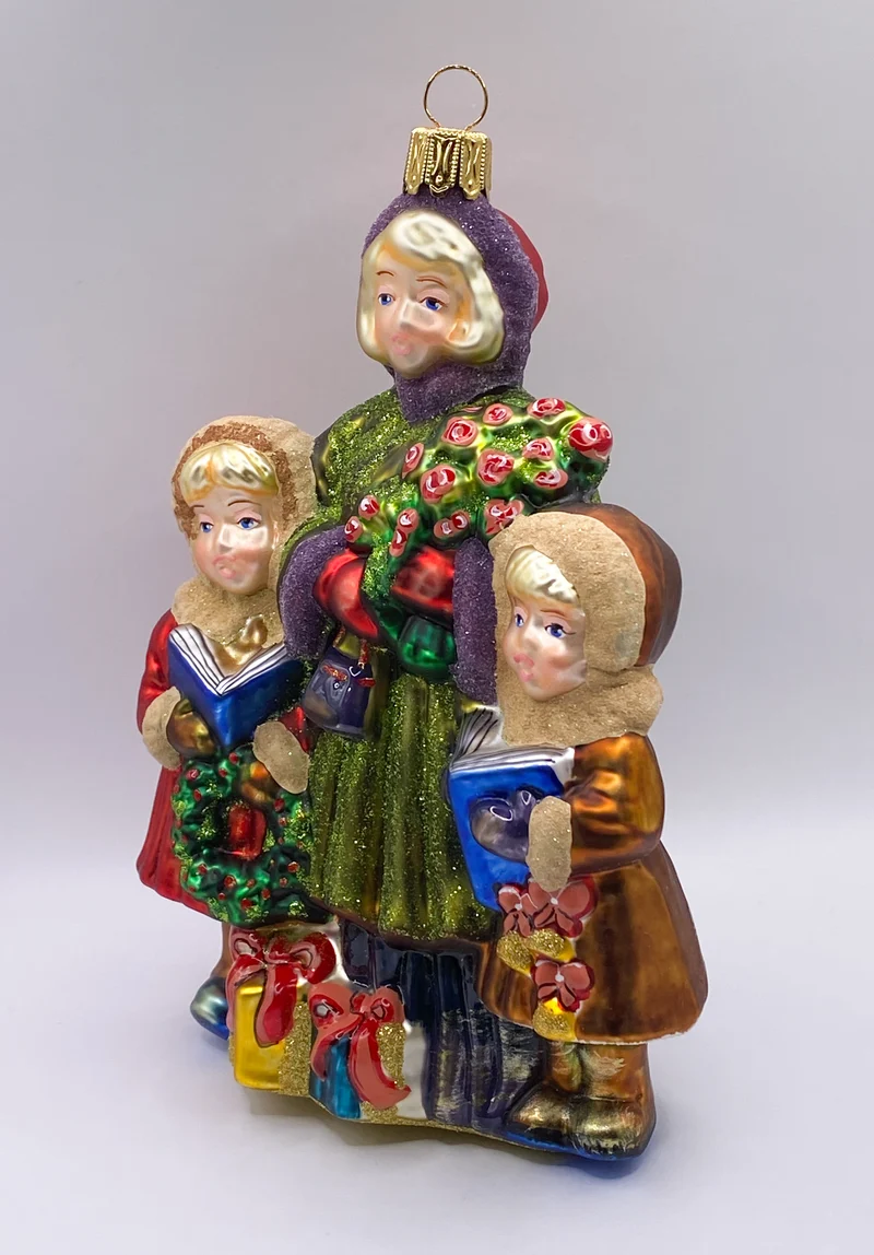 Die Mädchen singen mit der Mama Weihnachtslieder, KOMOZJA MOSTOWSKI